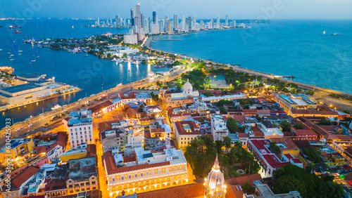 Tablou pe pânză drone fly above Cartagena walled city old historical downtown with modern skylin