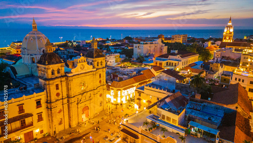 Cartagena, Colombia. Aerial View of Santuario de San Pedro Claver Church at Night, Traffic and Neighborhood, Drone  © Michele