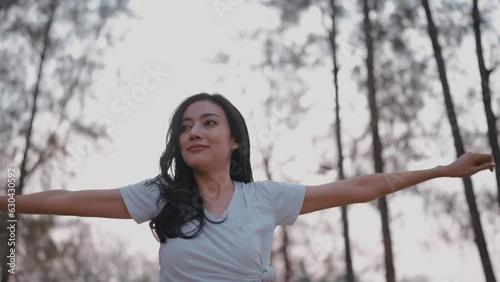 Fitness woman stretching before or after workout, Asian fit girl workout exercise in the morning at nature park outdoor, sport fitness lifestyle for athlete body to wellness healthy
