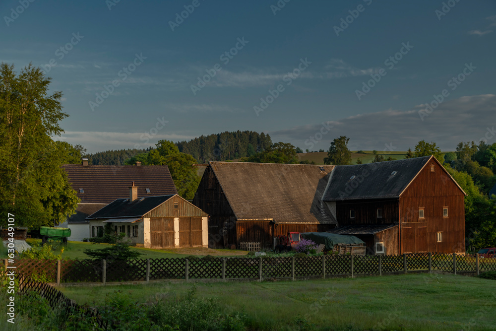 Old houses in Walthersdorf village in east Germany in early sunny morning
