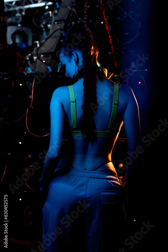 Fotografie Beautiful go-go dancer posing in a nightclub