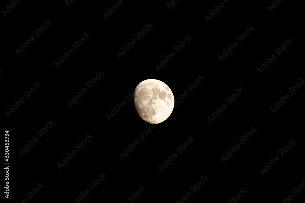 Isolated full moon phase of the moon black sky Isolated full moon phase of the moon black sky
