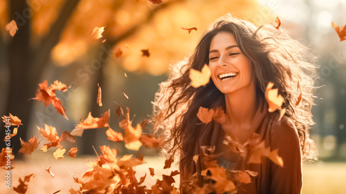 Portrait of casual joyful woman enjoy, having fun at the autumn season at park. Fall season fashion. 
