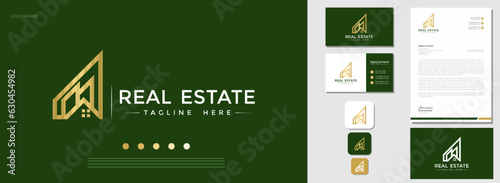 Modern style building real estate logo design with business card and letterhead template. the needs of construction, architecture, and business firms