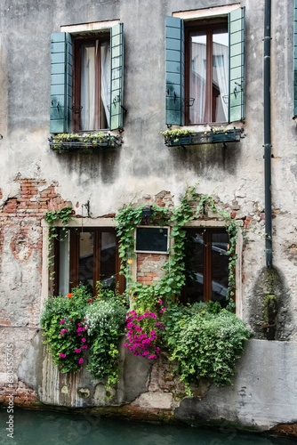 old window with flowers 