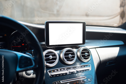 Car multimedia monitor with empty blank on screen. Mockup concept. Close-up view. © Lalandrew