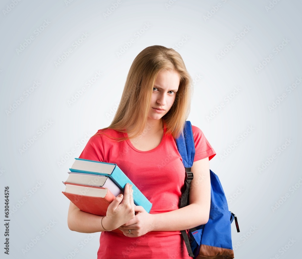 Young student girl posing with backpack Young student girl posing with backpack