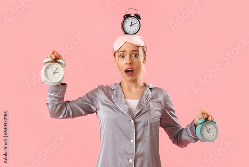 Young woman in pajamas with...