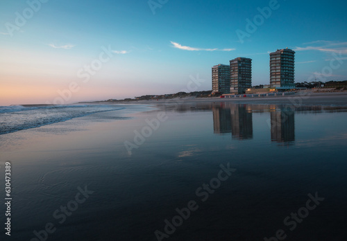 Ofir Towers reflected in the low tide sea during Sunset, Ofir, Braga, Portugal. photo
