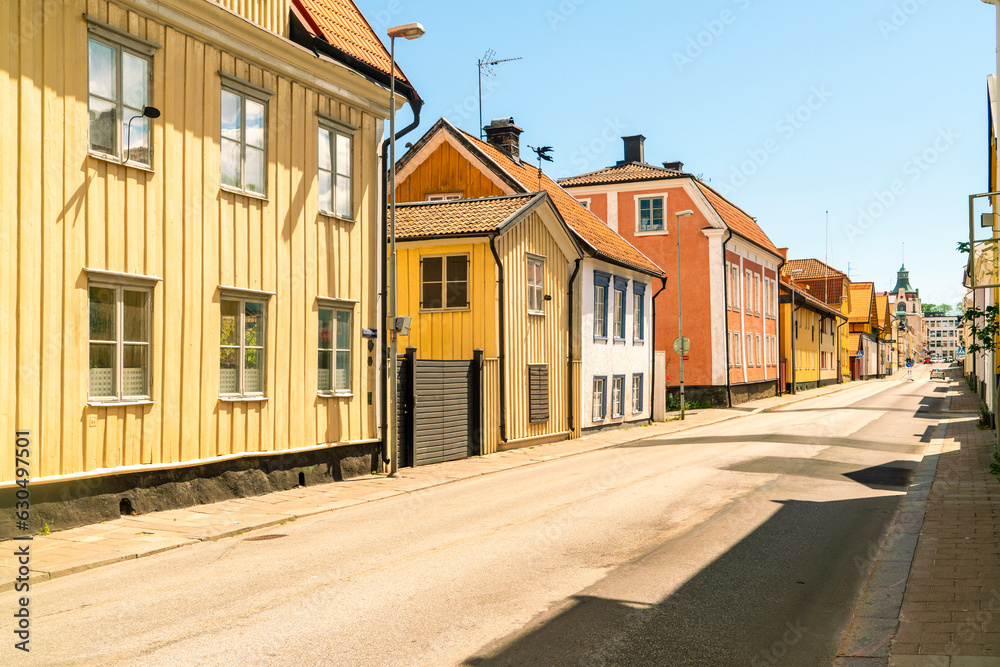 historic wooden houses at Hamngatan in the old city of Västervik, Sweden