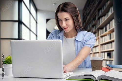 Beautiful Young female Manager works on computer, AI generated image