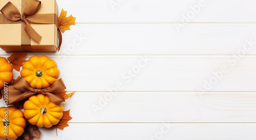 Autumn composition with pumpkins  gift boxes  orange leaves. Autumn harvest  Thanksgiving or Halloween background. top view flat lay