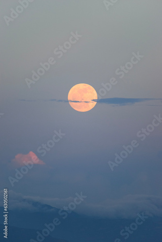 scenic moonrise over the mountains