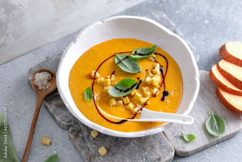 Pumpkin mashed soup with croutons photo