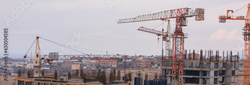 Construction house and crane