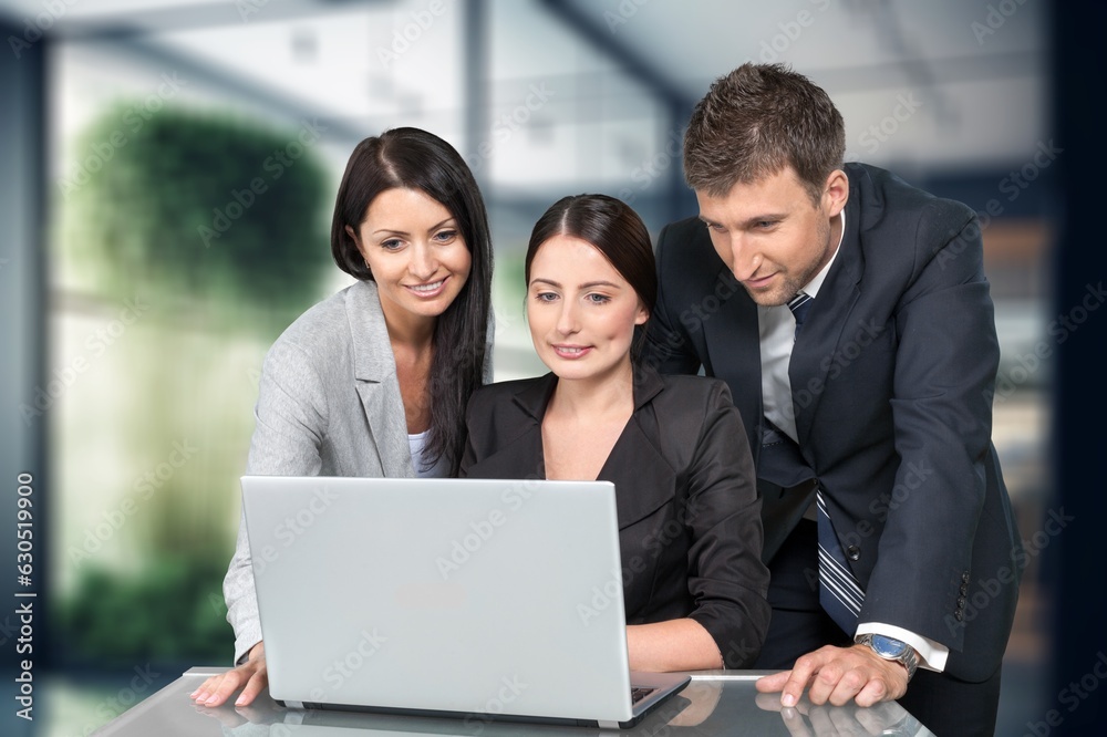 businesswoman working in modern office with laptop, AI generated image