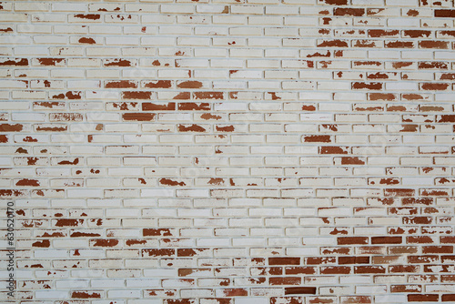 old white paint on red brick wall use as grounge background