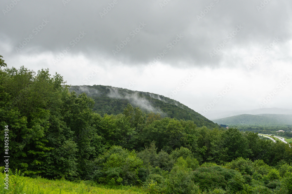 Valley town USA during rainy day, copy space landscape backgrounds, bad weather theme