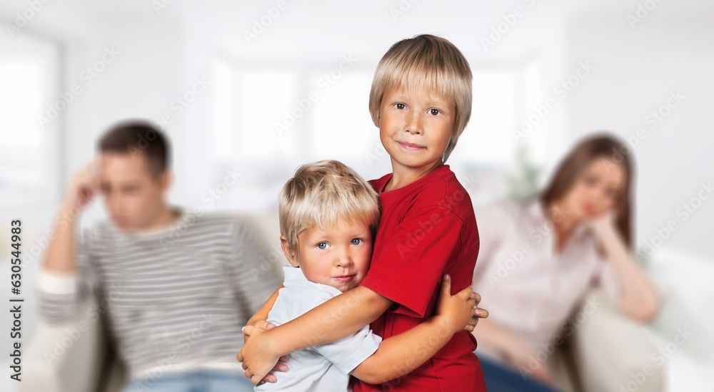 Sad child, fighting parents in living room