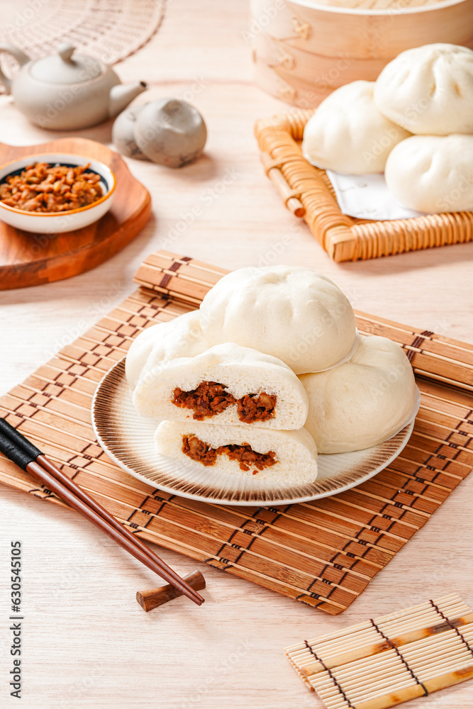 Baozi or Chinese Steamed Buns is a type of yeast-leavened filled bun in various Chinese cuisines.