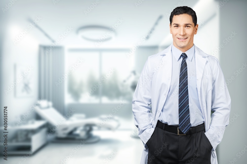 Obraz premium Portrait of friendly male doctor posing in clinic