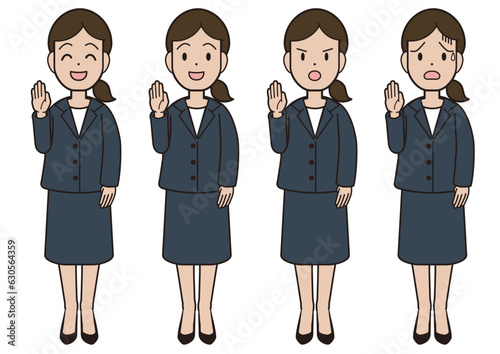 A young woman in a suit raising her hand