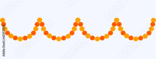 Traditional Indian Marigold Flower Garland with Mango leaves. Decoration for Indian hindu holidays or weddings or Puja Festival, Indian Festival flower decoration
