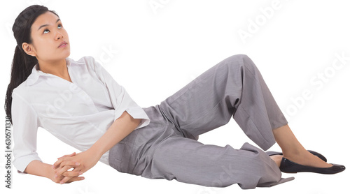 Fotografie Digital png photo of happy asian businesswoman lying down on transparent backgro