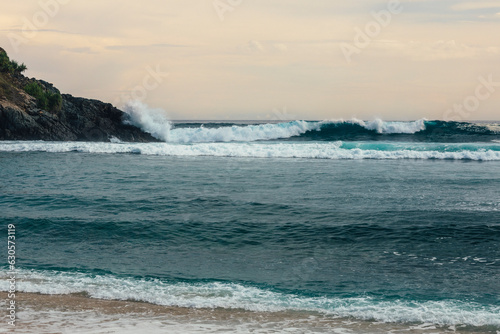 Wave breaking on tropical island.