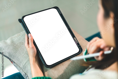Human working on modern tablet with blank white mobile screen for advertising, mockup, technology, advertising, search information, creative design, social media, online marketing, chat, phone