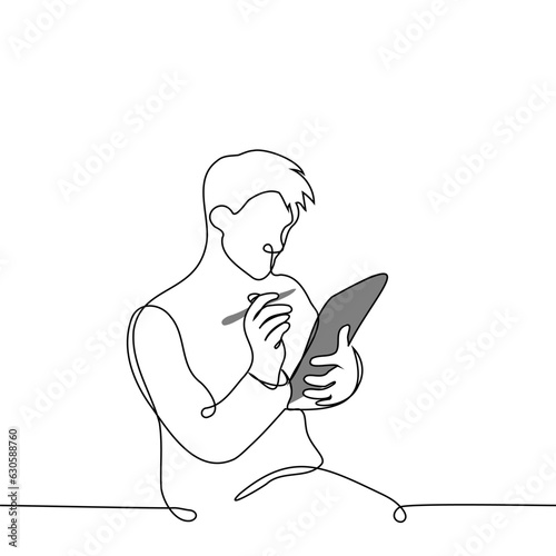 man sitting with digital tablet or graphics tablet holding stylus in right hand - one line art vector. the concept of taking notes on a tablet, digital artist