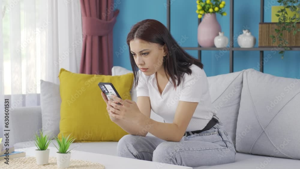 Young woman getting breakup texting gets upset. Young woman getting breakup texting gets upset.