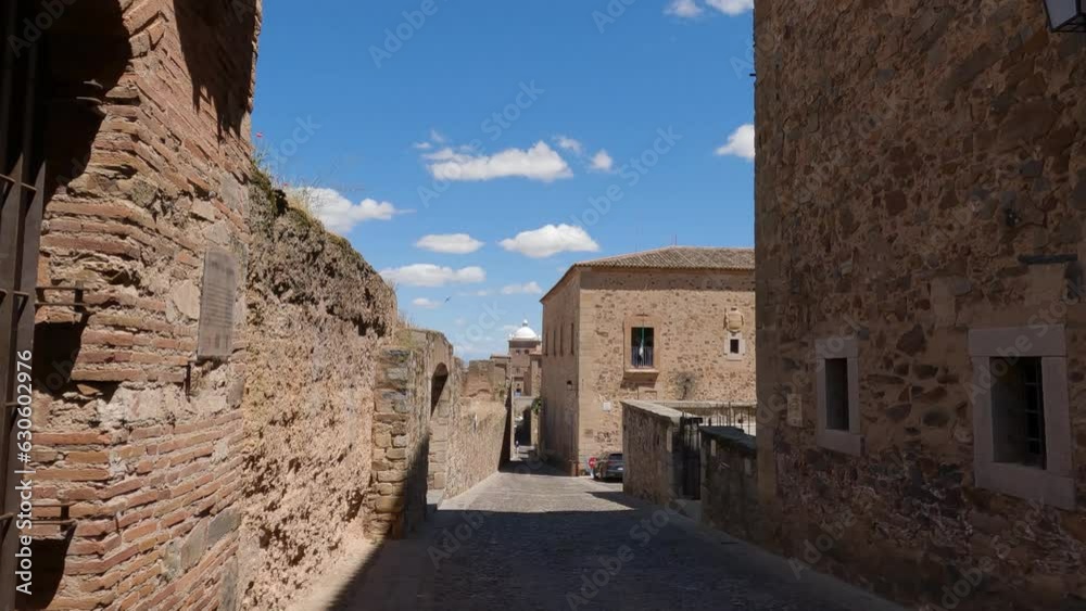 Street scene in picturesque old town of Caceres, walled city, Spain. Tilt down Street scene in picturesque old town of Caceres, walled city, Spain. Tilt down