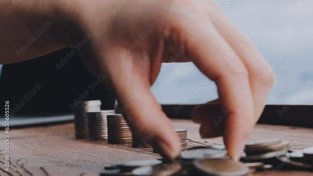 Business women put coin stack money and many bank note in office, Save money for future and Retirement. Business women put coin stack money and many bank note in office, Save money for future and Retirement.