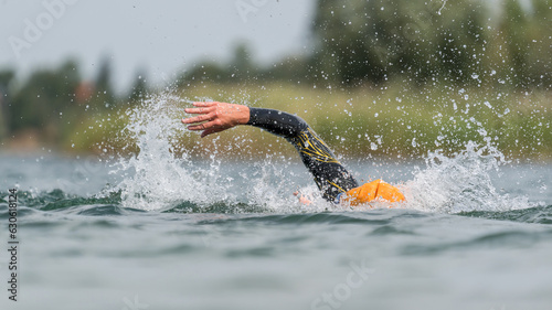 Swimming in a lake in a wetsuit © DZiegler