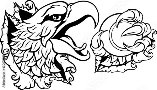 A bald eagle or hawk with claw talons holding a tennis ball and ripping or tearing through the background. Sports Mascot