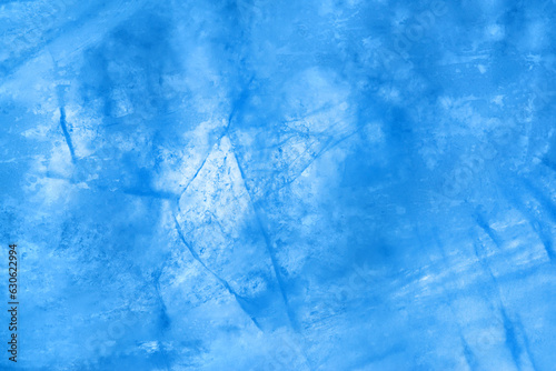 Blue ice texture with cracks, close-up, macro.