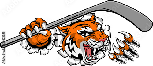 Fototapeta Naklejka Na Ścianę i Meble -  A tiger ice hockey player animal sports mascot holding a hockey stick