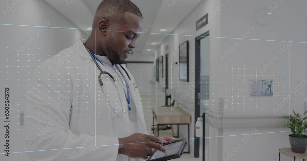 Animation of data processing over african american male doctor in hospital Animation of data processing over african american male doctor in hospital