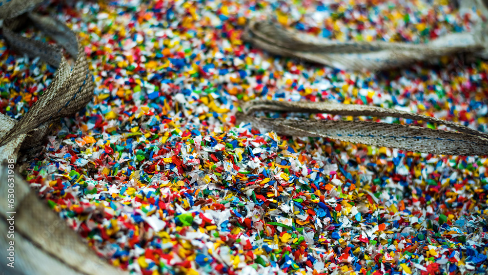 Shredded plastic garbage at waste recycling factory