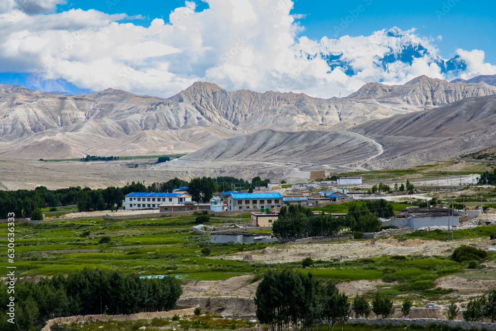 Beautiful Chhoser Village with desert landscape in Lo Manthang of Upper Mustang in Nepal