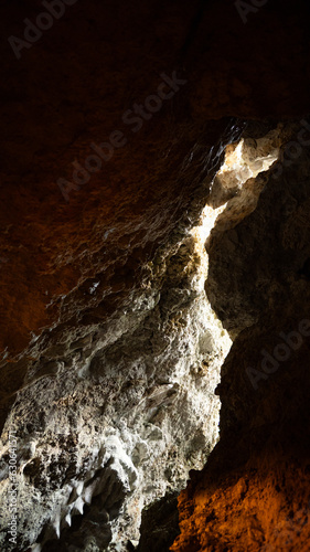 Light shone through the holes in the mountains.