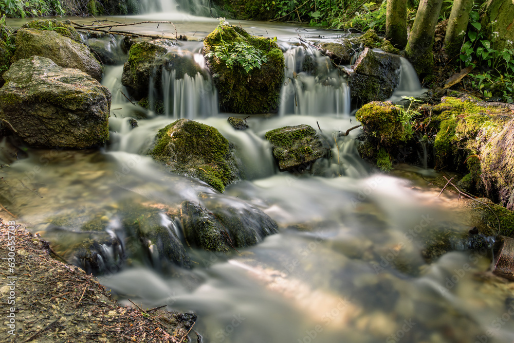 Serene Cascading River Amidst Vibrant Autumn Landscape Serene Cascading River Amidst Vibrant Autumn Landscape