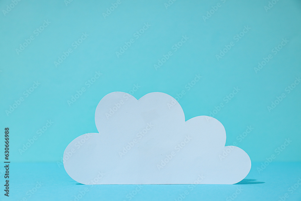 White paper cloud on a blue background, cloud computing concept White paper cloud on a blue background, cloud computing concept