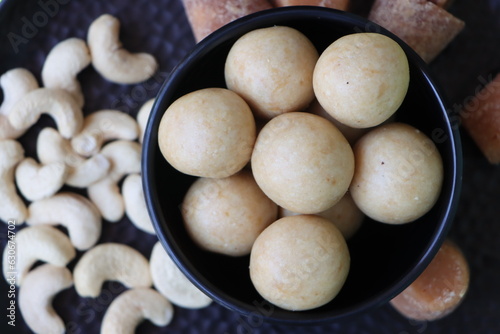 Kaju Laddu or kaju ladoo or cashew Laddoo or cashew sweet balls made with cashew flour and jaggery, Indian sweet photo