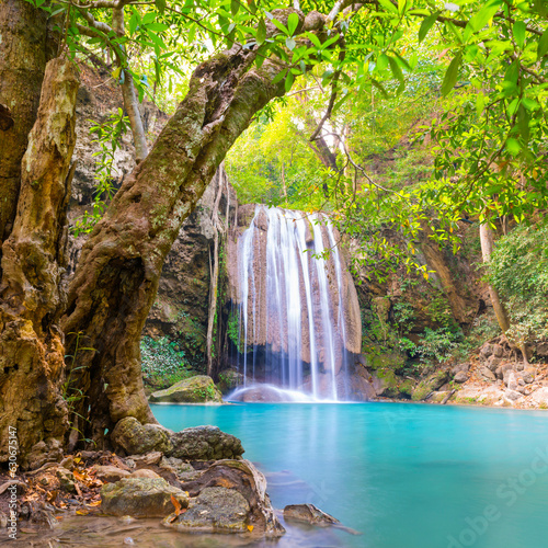 Waterfall in tropical forest with green tree and emerald lake  Erawan  Thailand