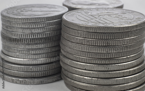 Silver coins from different countries and times - coin towers, makro photo