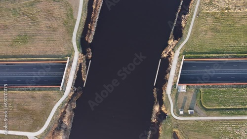 Boat crossing road. Netherlands canal with underpass for traffic