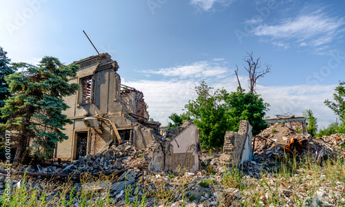 destroyed and burned houses in the city Russia Ukraine war photo