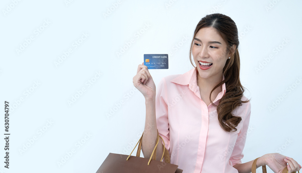 asian female holding shopping bag asian female holding shopping bag